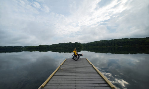 wheelchair outdoors lake